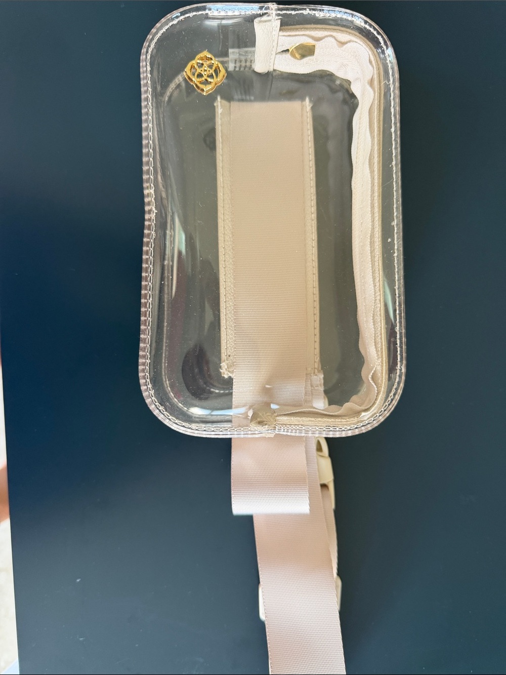 Kendra Scott Clear Crossbody Phone Bag with Beige Strap and Gold Logo